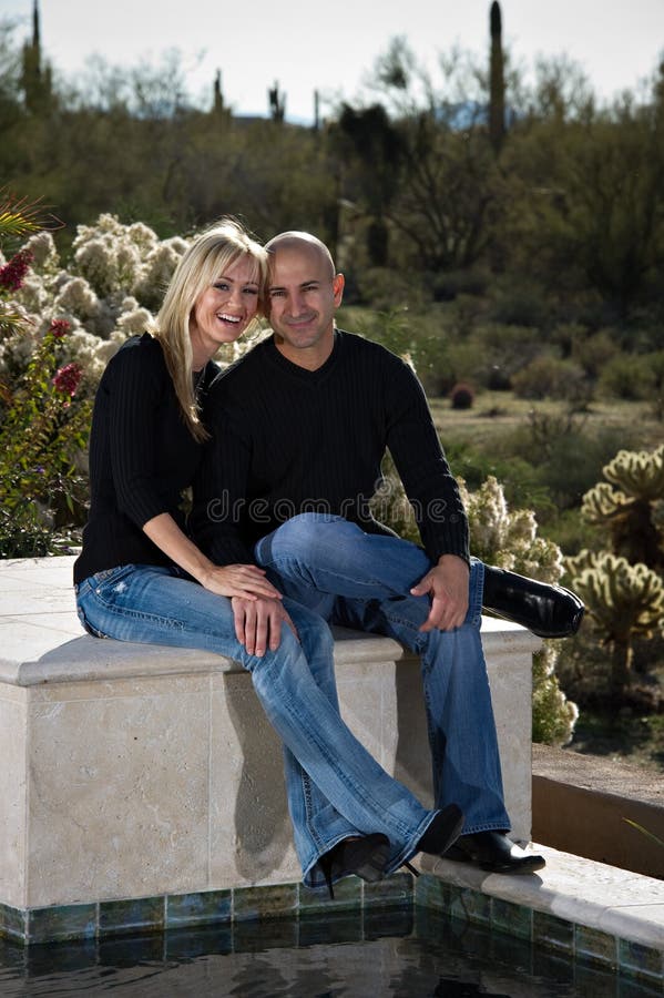 Laughing Couple by the Pool Stock Image Image of december, lovely