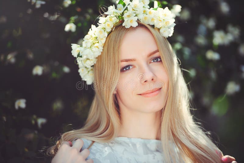 Attractive Modest Young Girl with Blonde with Jasmine Flowers Wreath on  Head Long Hair and Natural Make-up in White Dress Outdoors Stock Photo -  Image of dress, female: 115253670