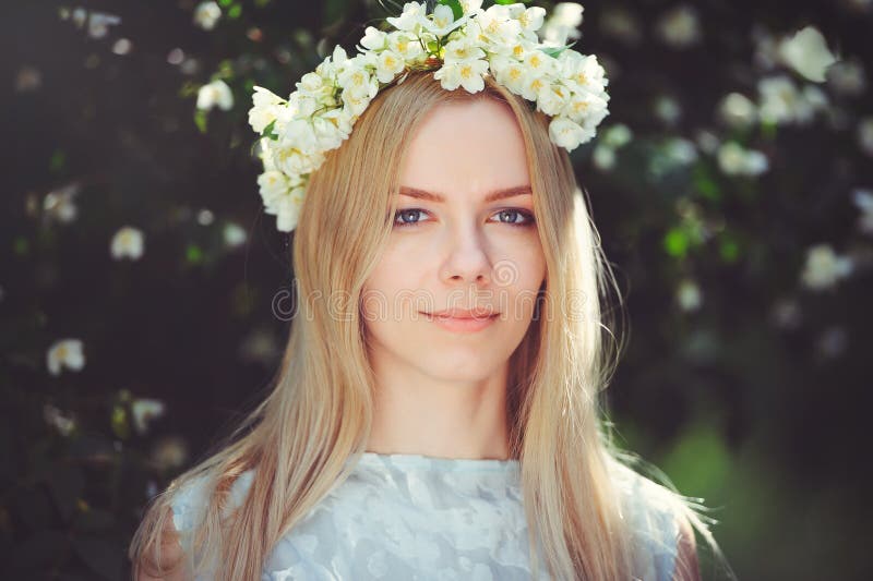 Attractive Modest Young Girl with Blonde with Jasmine Flowers Wreath on  Head Long Hair and Natural Make-up in White Dress Outdoors Stock Image -  Image of hair, background: 115322575