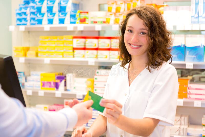 Attractive Pharmacist Taking Healt Insurance Card Stock Image - Image
