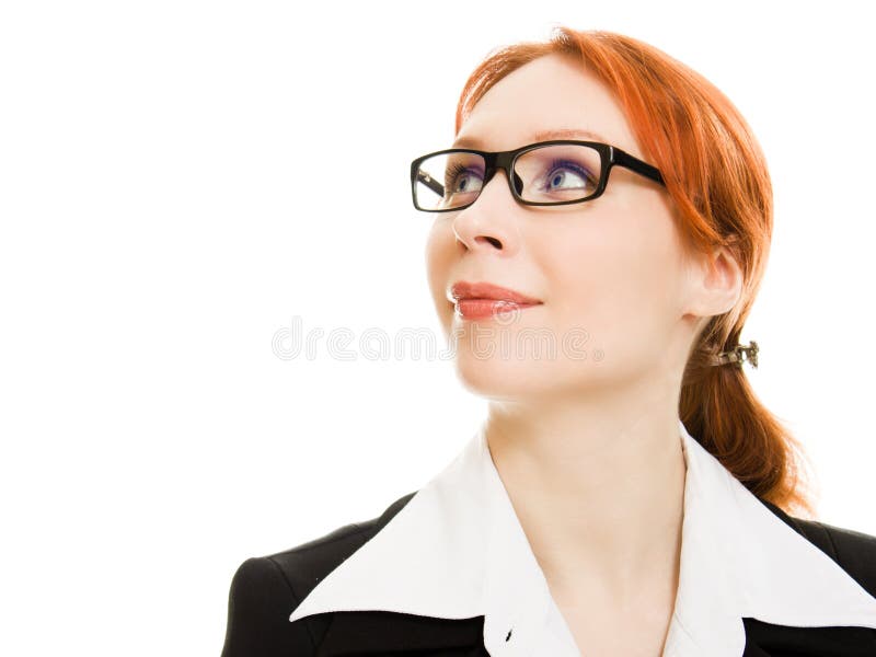 Attractive red-haired business woman in glasses