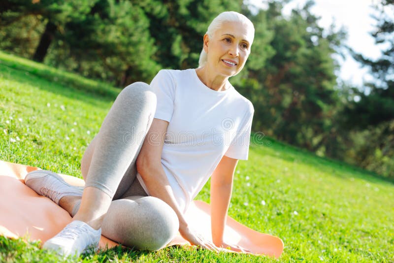 Attractive Retirement Woman Having Rest on Nature Stock Photo - Image ...