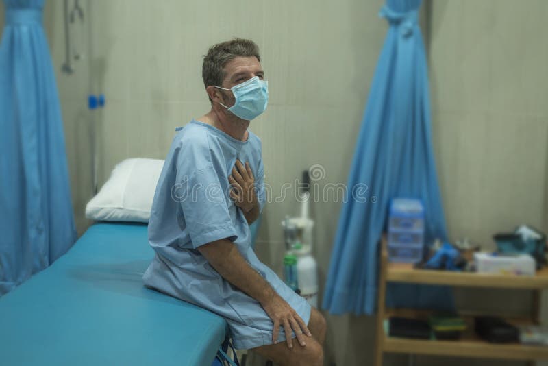 Attractive and scared man infected by covid-19 - dramatic portra stock images Attractive and scared man infected by covid-19 - dramatic portra stock images