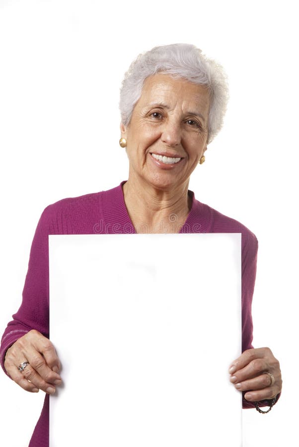 Attractive senior woman holding blank billboard royalty free stock image Attractive senior woman holding blank billboard royalty free stock image