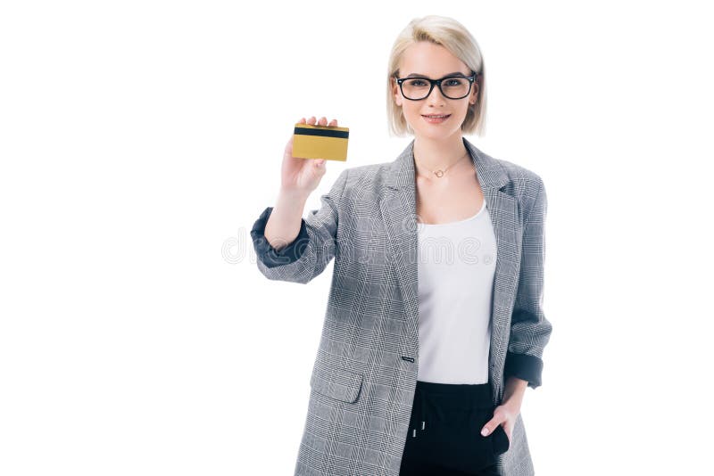 Attractive stylish businesswoman showing credit card