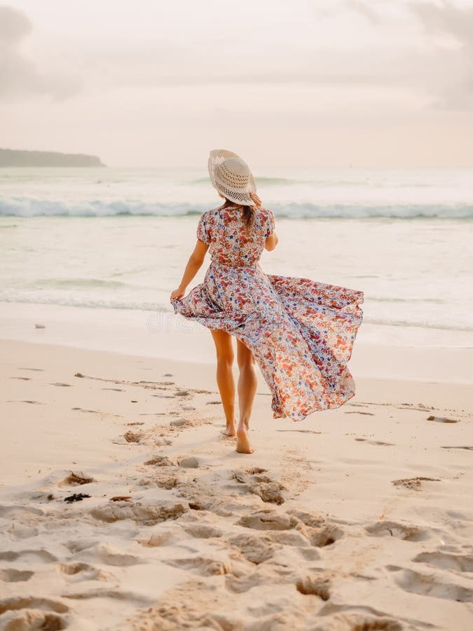 Attractive Stylish Woman in Summer Dress on Beach at Sunset or Sunrise ...