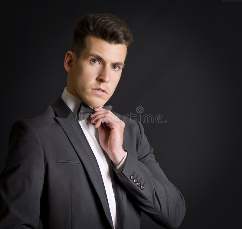 Attractive Man in Suit Communicating on Telephone Stock Photo Image