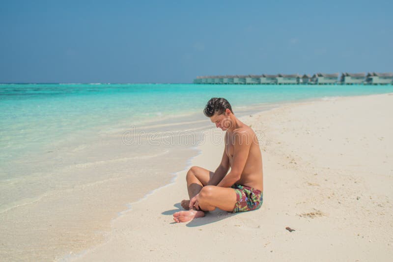 Sexy Man In Underwear On The Beach. Walking Along The Ocean Beach. Stock  Photo, Picture and Royalty Free Image. Image 138952305.