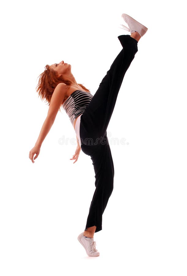 Attractive teenage dancing over white background