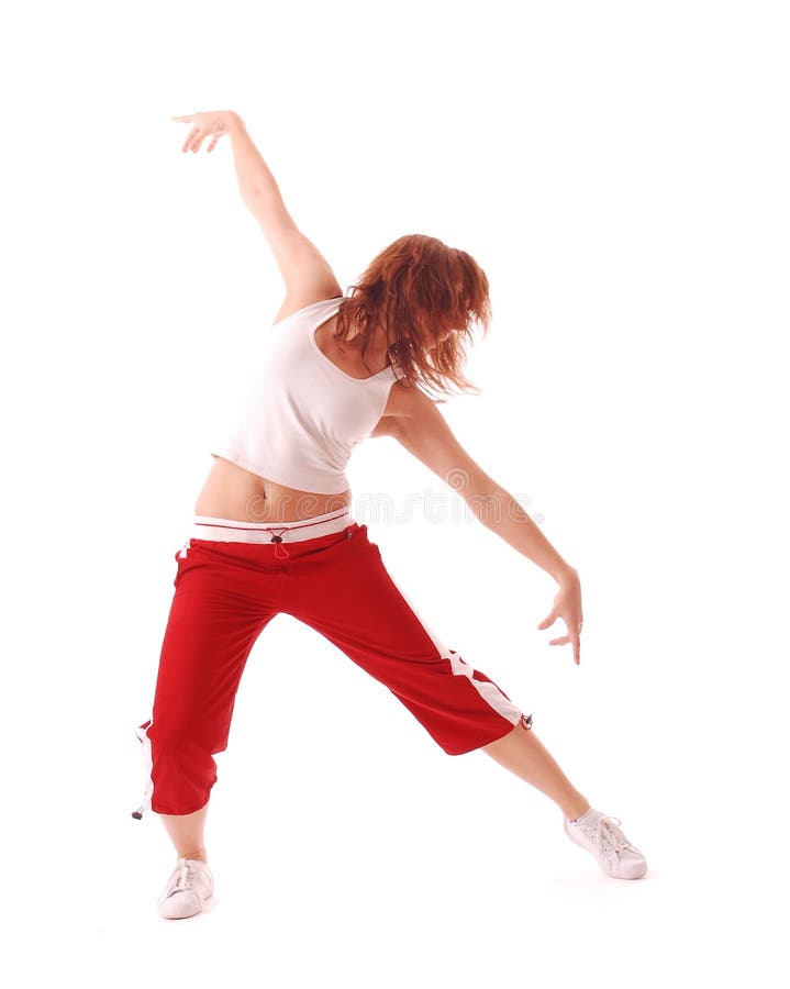 Attractive teenage dancing over white background