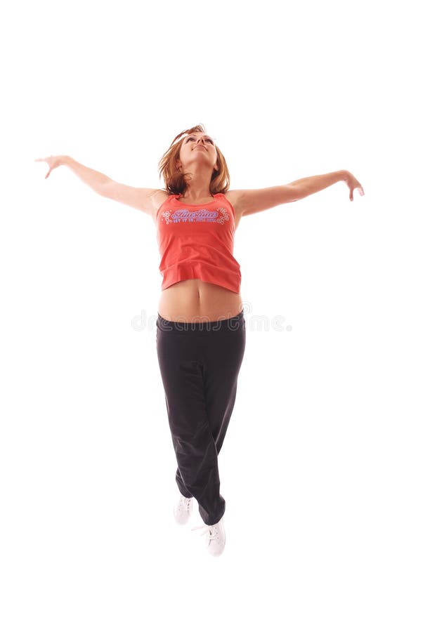 Attractive teenage dancing over white background