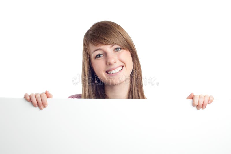 Attractive woman with blank sign. Smiling.