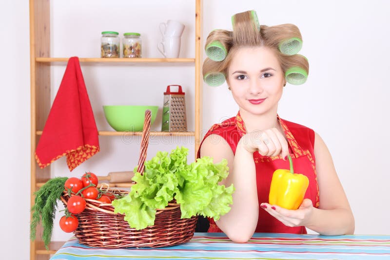 Attractive Woman with Hair Curlers in the Kitchen Stock Photo Image
