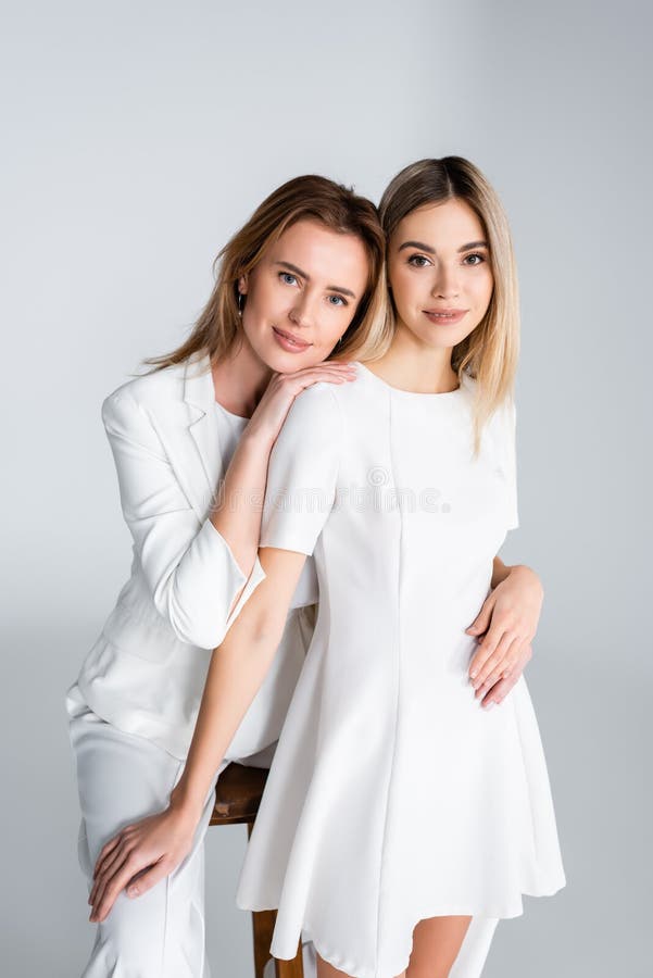 attractive woman with her daughter isolated