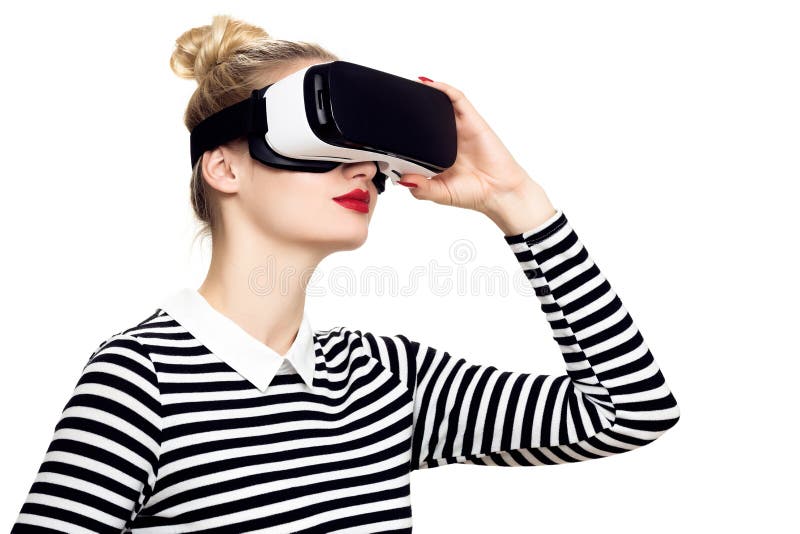 Attractive woman wearing virtual reality glasses. VR headset. VR concept on white background.