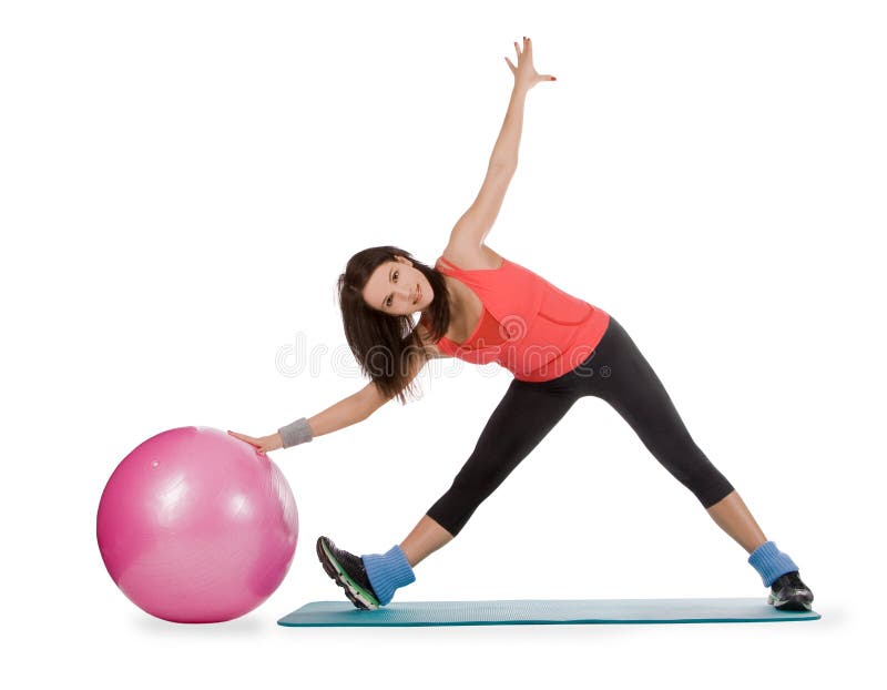 Young female with fitness ball in stretching royalty free stock images Young female with fitness ball in stretching royalty free stock images