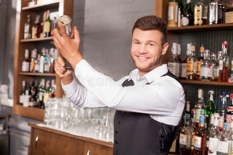 Attractive Young Male Bartender  Is Shaking Stock Image 