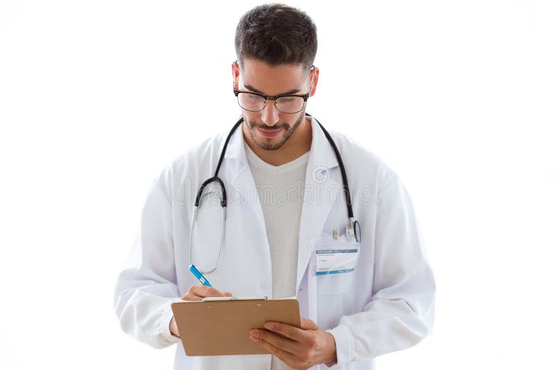 Attractive young male doctor with stethoscope over neck taking notes in clipboard isolated on white background. stock images Attractive young male doctor with stethoscope over neck taking notes in clipboard isolated on white background. stock images
