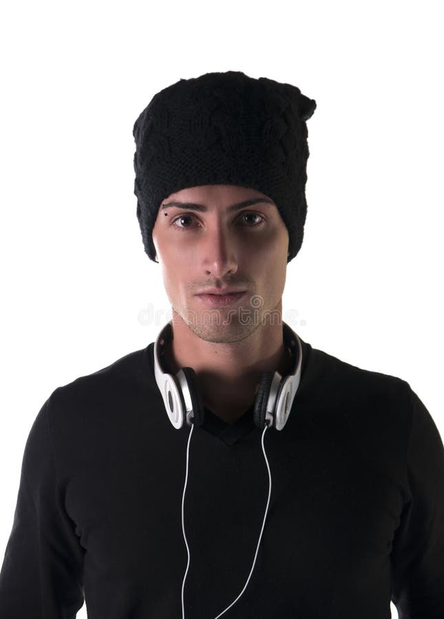 Attractive Young Man with Black Wool Hat and Headphones Stock Image
