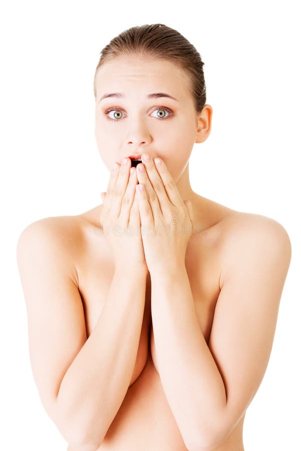 Attractive young naked woman expresses a shock. royalty free stock images Attractive young naked woman expresses a shock. royalty free stock images