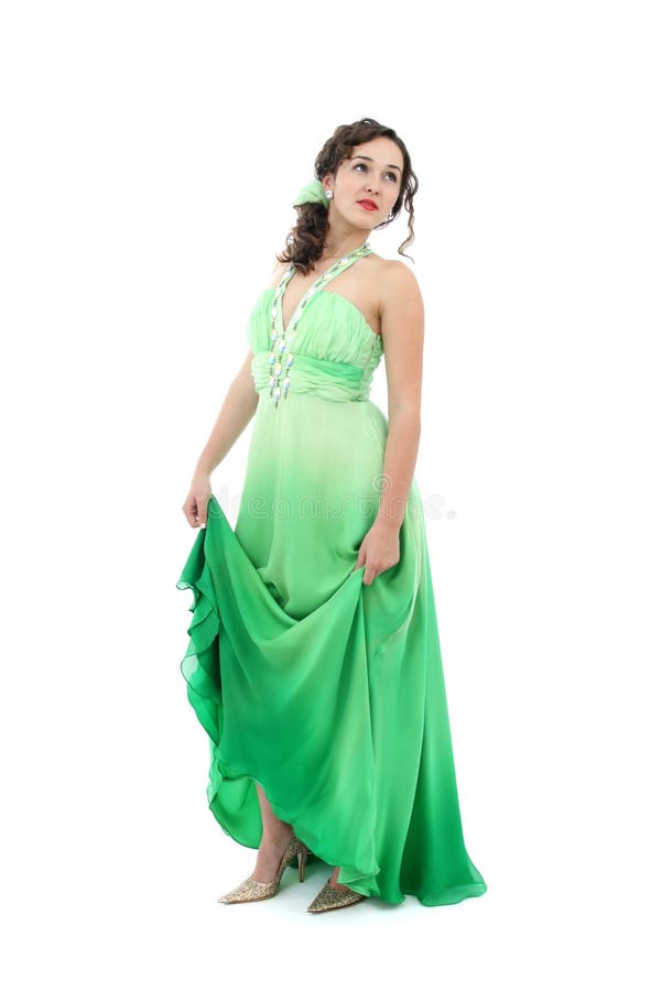 Attractive young woman in green dress