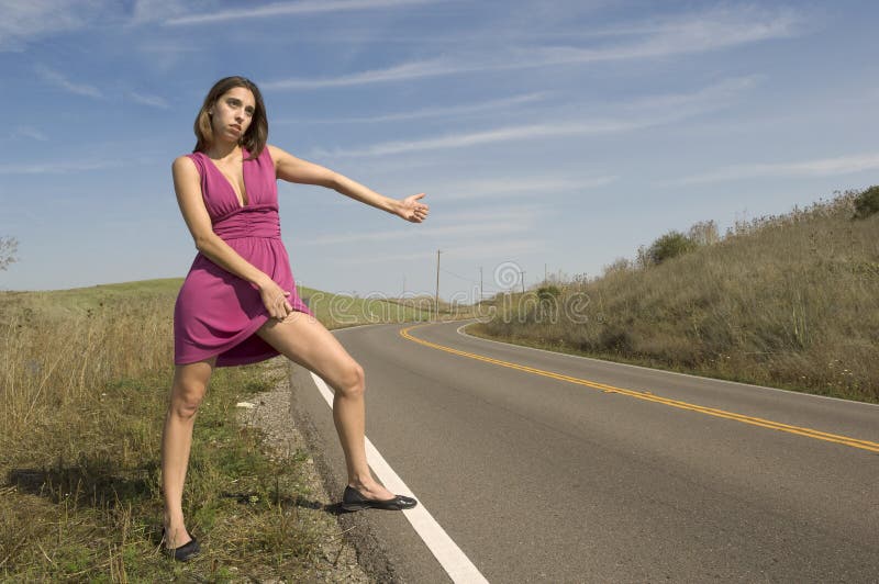 Attractive Young Woman Hitch Hiking Royalty Free Stock Photos Image