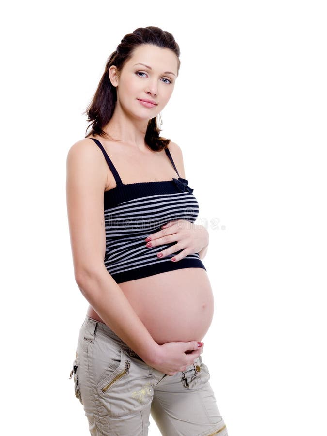 attraktiv lycklig gravid kvinna royaltyfri fotografi attraktiv lycklig gravid kvinna royaltyfri fotografi