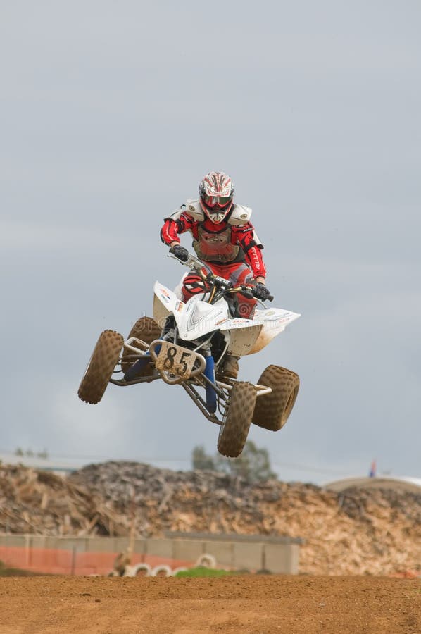 ATV Motocross Rider Over a jump
