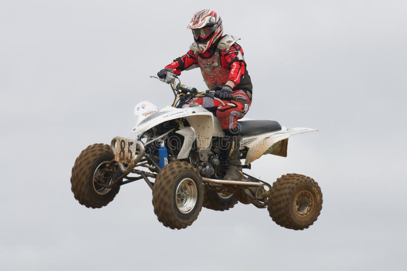 ATV Motocross Rider Over a jump