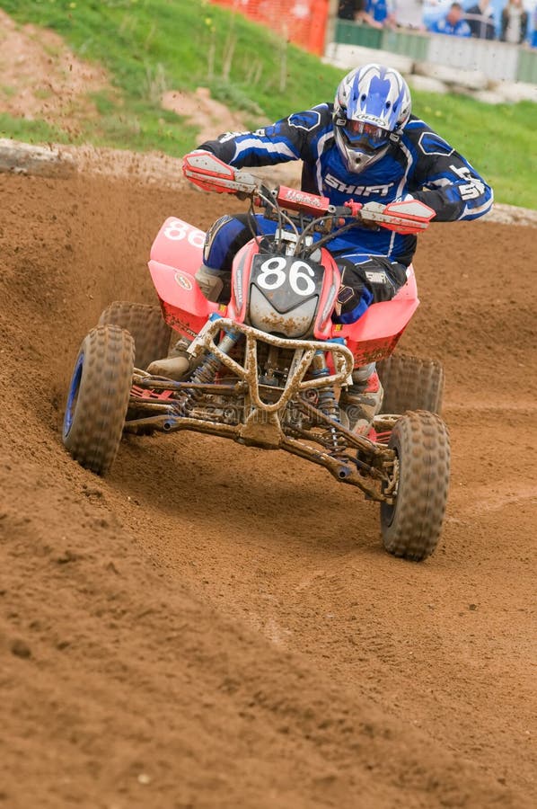 ATV Motocross Rider powering out of corner