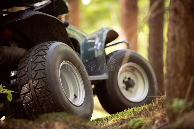 ATV's parked in the parking lot in the forest. good weather. stock image ATV's parked in the parking lot in the forest. good weather. stock image