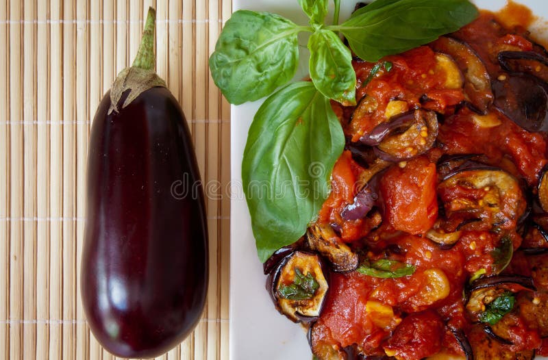 Aubergines in tomato sauce, detail