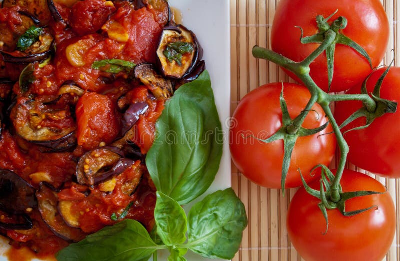 Aubergines in tomato sauce, detail