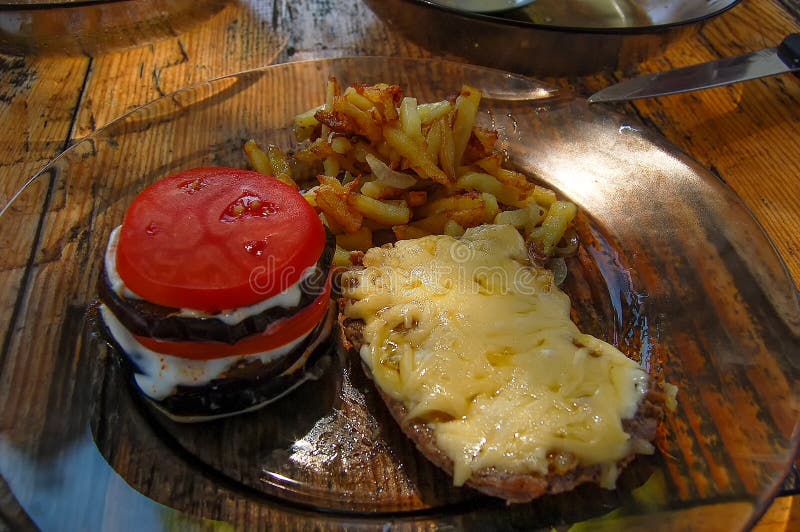 Aubergines tomatoes French fries meet