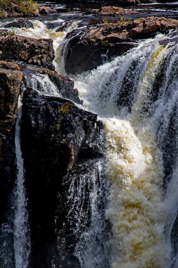 Waterfall at Aubrey Falls Provincial Park in the Algoma District of Northern Ontario, Canada. The cascade is on the Mississagi River north of Sault Ste. Marie and Lake Huron. Waterfall at Aubrey Falls Provincial Park in the Algoma District of Northern Ontario, Canada. The cascade is on the Mississagi River north of Sault Ste. Marie and Lake Huron.