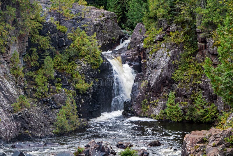 Waterfall at Aubrey Falls Provincial Park in the Algoma District of Northern Ontario, Canada. The cascade is on the Mississagi River north of Sault Ste. Marie and Lake Huron. Waterfall at Aubrey Falls Provincial Park in the Algoma District of Northern Ontario, Canada. The cascade is on the Mississagi River north of Sault Ste. Marie and Lake Huron.