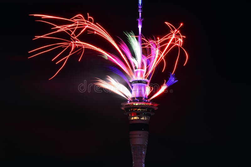 Auckland Sky Tower firework display to celebrate 2016 New Year. AUCKLAND, NZL - JAN 01 2016:Auckland Sky Tower displaying a spectacular firework display to stock photography Auckland Sky Tower firework display to celebrate 2016 New Year. AUCKLAND, NZL - JAN 01 2016:Auckland Sky Tower displaying a spectacular firework display to stock photography