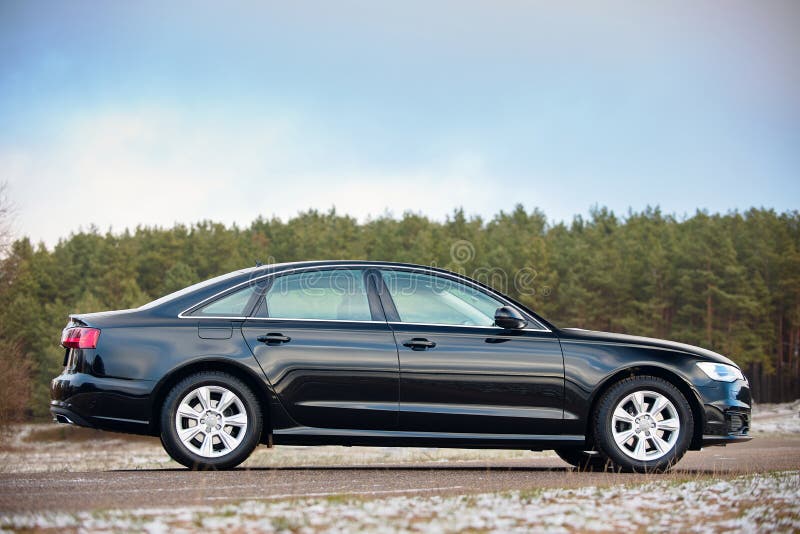 GRODNO, BELARUS - DECEMBER 2019: Audi A6 4G, C7 2.0 TDI 190 Hp 2016 black  metallic right side view outdoors on winter empty road with forest on Stock  Photo - Alamy