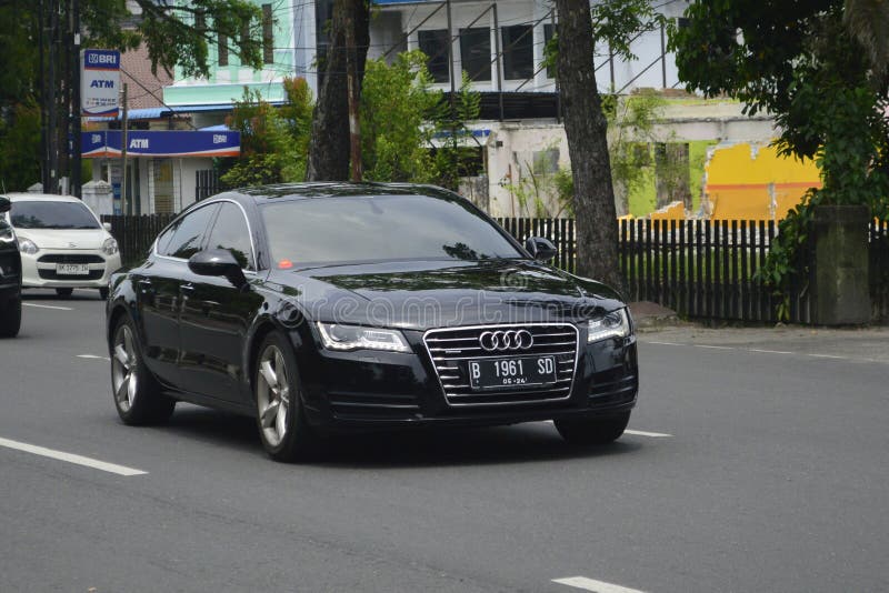 A black sedan 2014 Audi A7 3.0T on the streets in Medan, North Sumatra, Indonesia &#x28;Apr 3, 2024&#x29;. A black sedan 2014 Audi A7 3.0T on the streets in Medan, North Sumatra, Indonesia &#x28;Apr 3, 2024&#x29;.