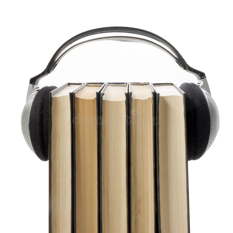 Audio book Stack of hardback books and electronic reader. Electronic library concept. Back to school. Copy space