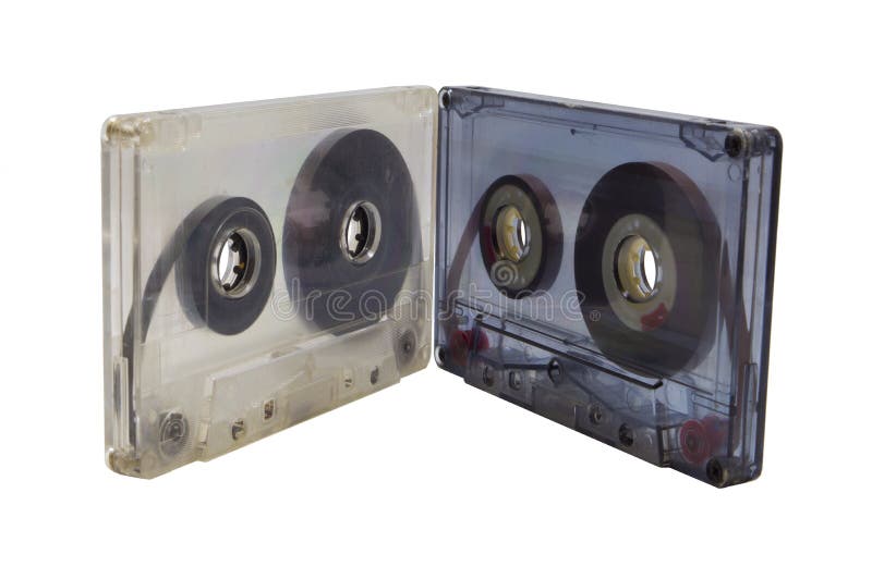 Two Audio Cassettes On A Wooden Table. Retro Media Technology From The
