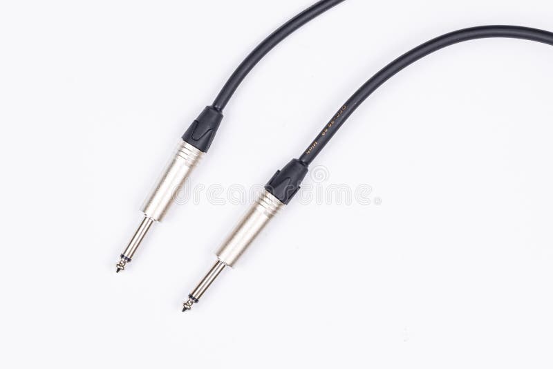 Audio Guitar and Microphone Cable Isolated Above White Background Stock