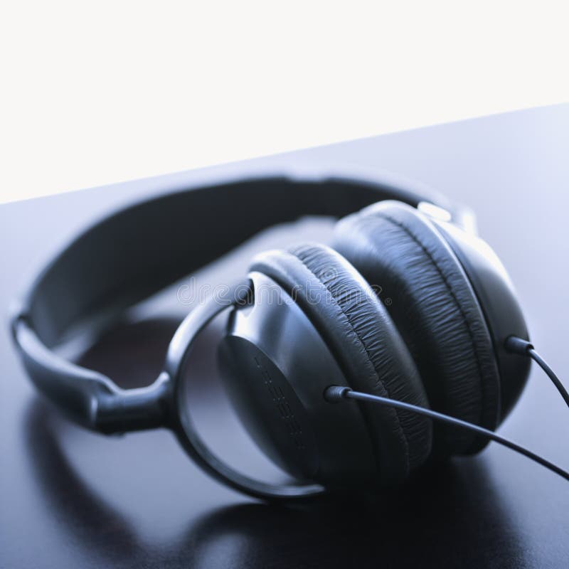 Audio Headphones and Compact Discs Stock Photo Image of background