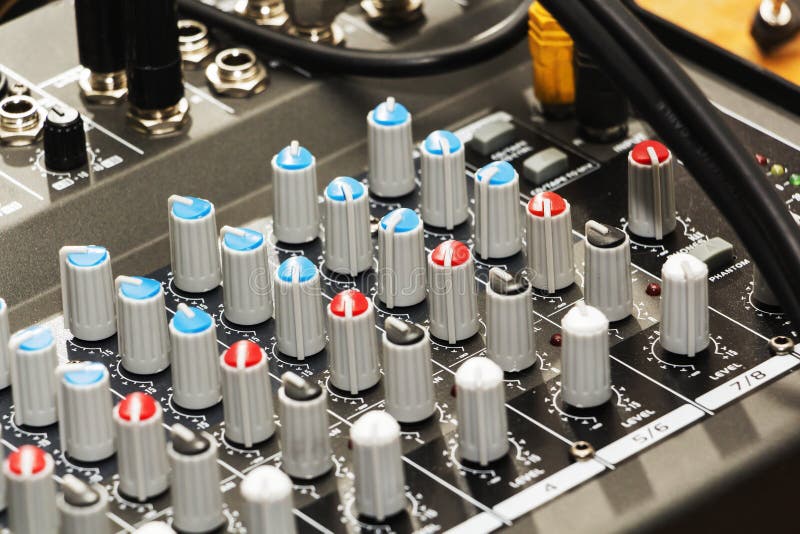 Audio jack and wires connected to audio mixer, music dj equipment at concert, festival, bar. royalty free stock image Audio jack and wires connected to audio mixer, music dj equipment at concert, festival, bar. royalty free stock image