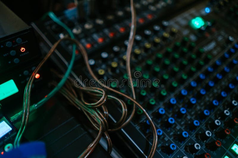 An Audio Mixer with Multiple Channels, Knobs, and Sliders for Adjusting