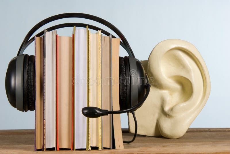 Audio libro concepto auriculares a libros.