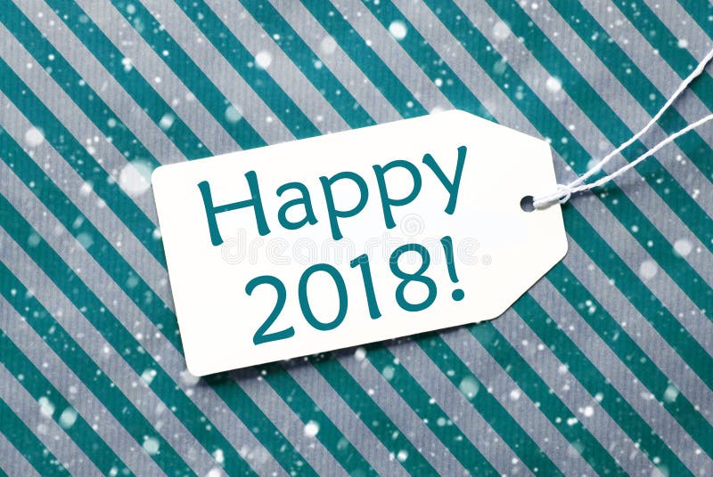 One Label On A Turquoise Striped Wrapping Paper. Textured Background With Snowflakes. Tag With Ribbon. English Text Happy 2018 For Happy New Year Greetings. One Label On A Turquoise Striped Wrapping Paper. Textured Background With Snowflakes. Tag With Ribbon. English Text Happy 2018 For Happy New Year Greetings