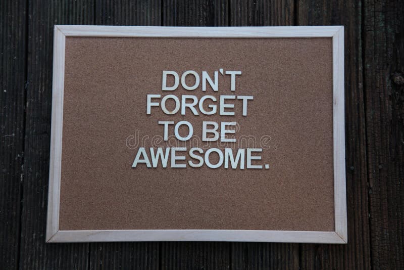 Encouraging words that says don& x27;t forget to be awesome on a corkboard background in brown. Encouraging words that says don& x27;t forget to be awesome on a corkboard background in brown