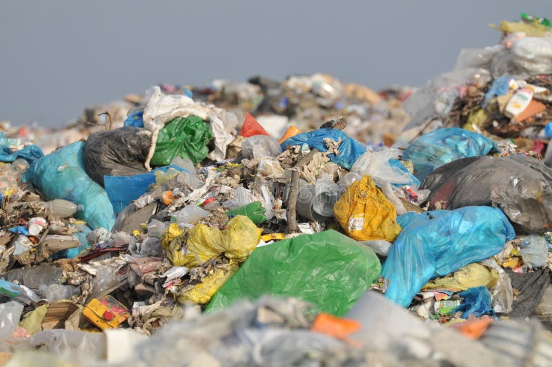 Pile of waste and garbage in bags in the landfill. Pile of waste and garbage in bags in the landfill