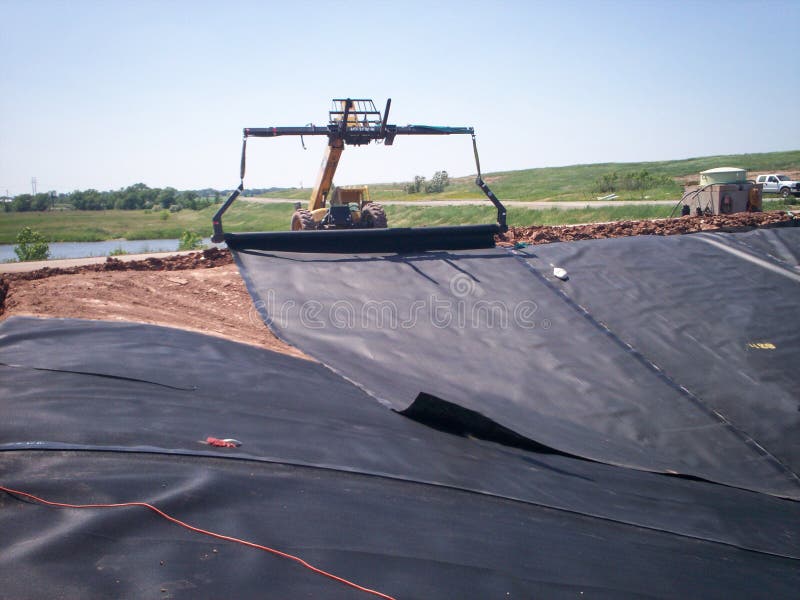 60 mil HDPE Liner for new landfill cell construction. 60 mil HDPE Liner for new landfill cell construction.